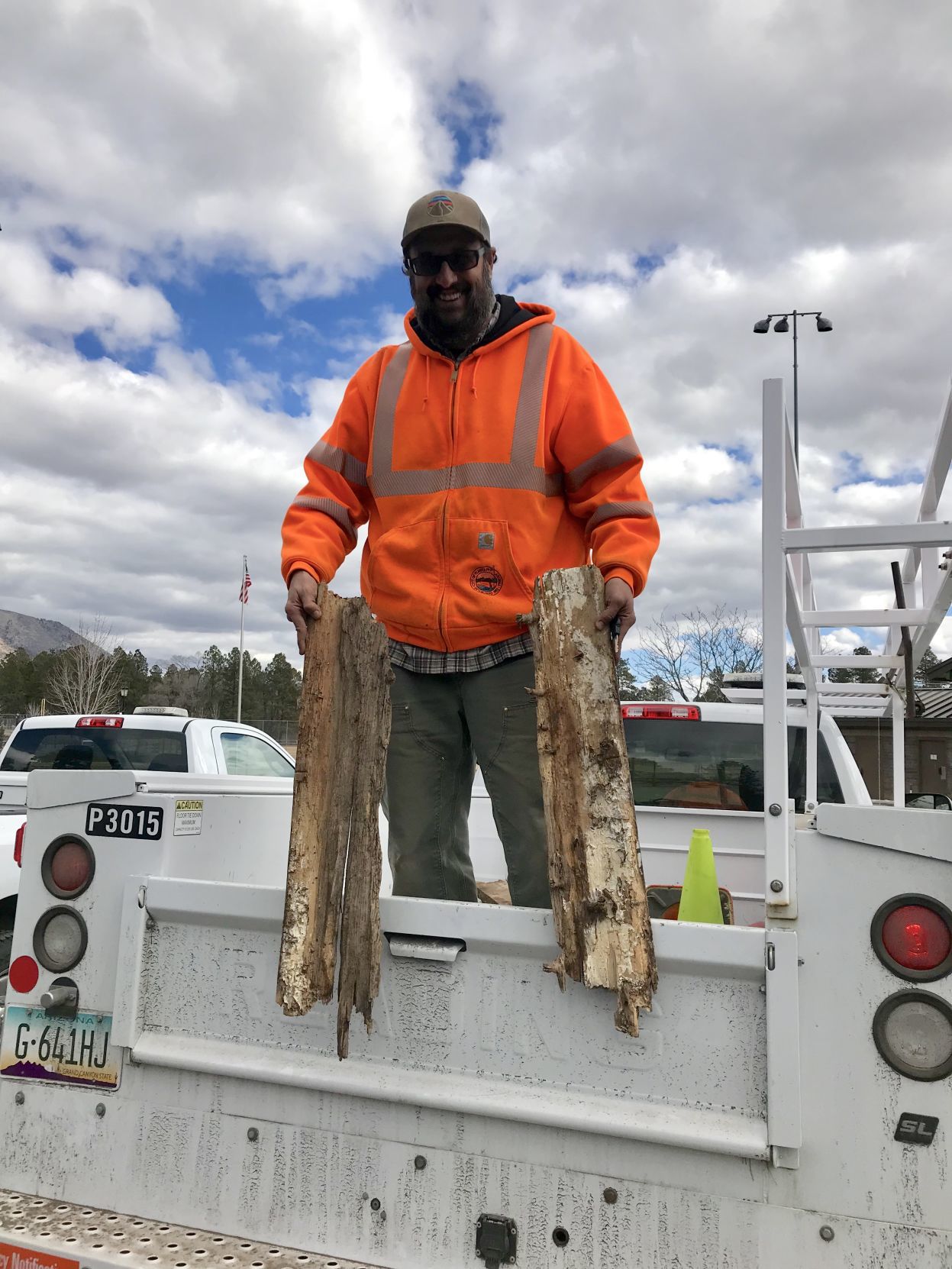 Gino Leoni holds two pieces of the Wheeler Park Bridge